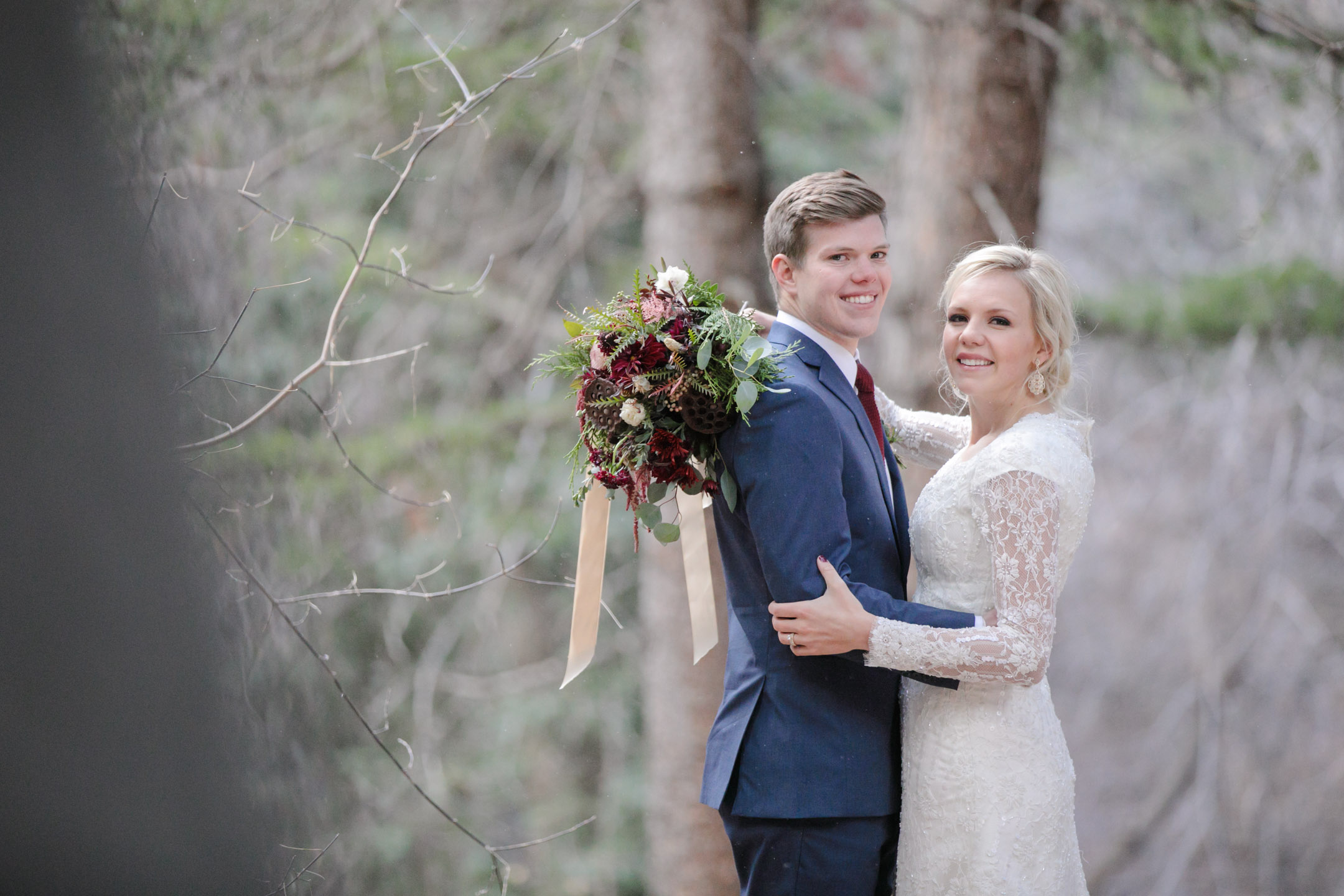 EK-Studios-Utah-Wedding-Photographers-Bridals-in-the-woods-pines-winter-dark-red-floral015-Blog