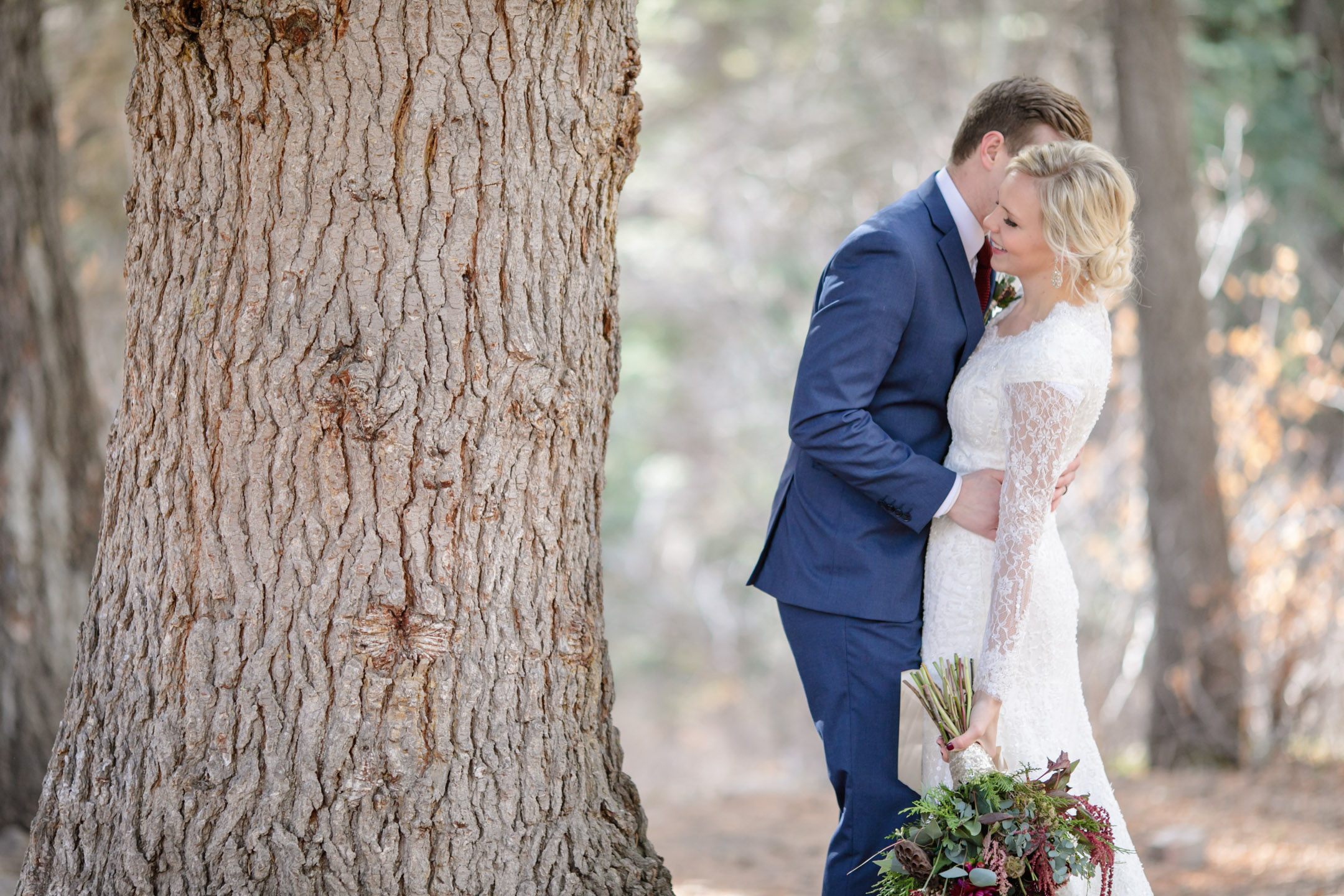 EK-Studios-Utah-Wedding-Photographers-Bridals-in-the-woods-pines-winter-dark-red-floral017-Blog